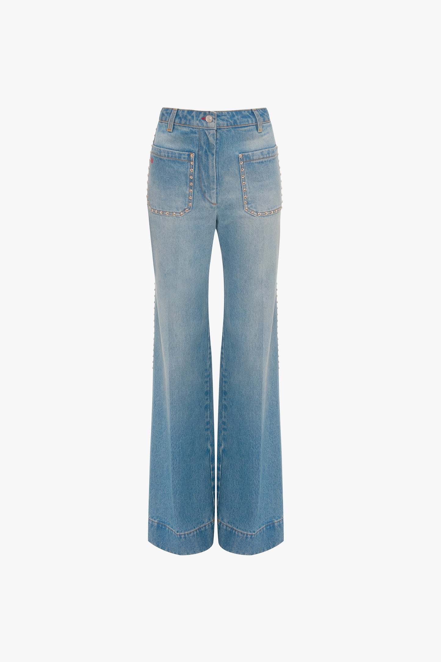The BAO TEST R - Alina High Waisted Jeans by Victoria Beckham, in vintage wash, showcase a classic flared design with front and back pockets against a crisp white backdrop for a timeless denim appeal.