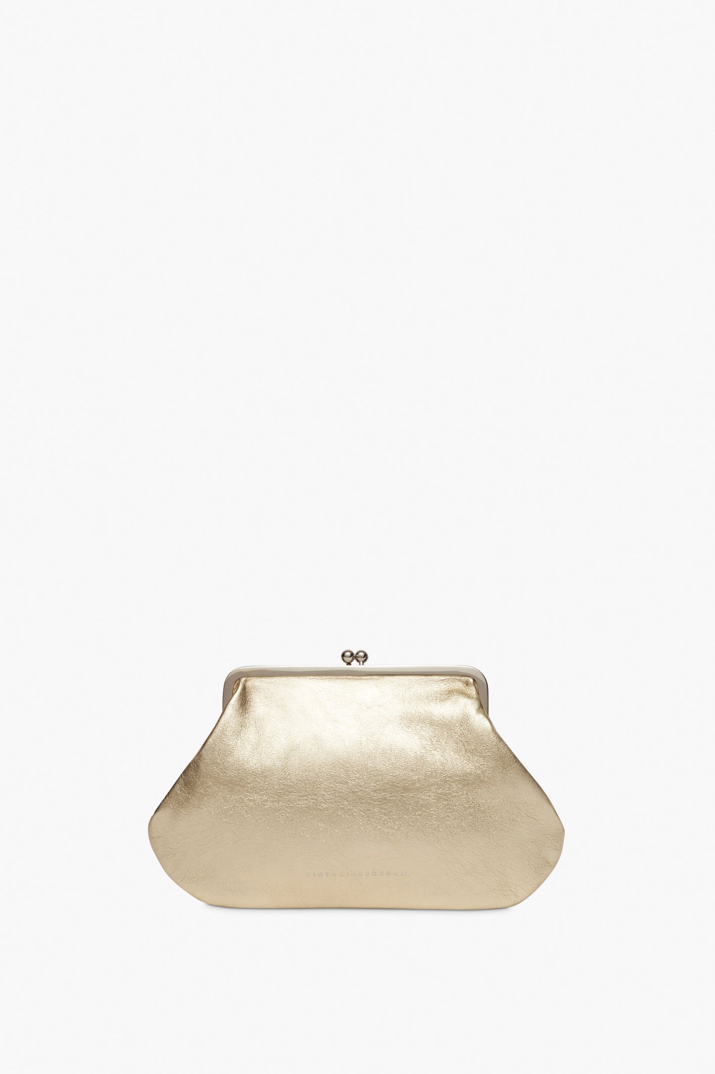 Victoria Beckham's Pocket Clutch in Gold features a kiss lock closure and a sleek silver frame, showcased against a plain white background.