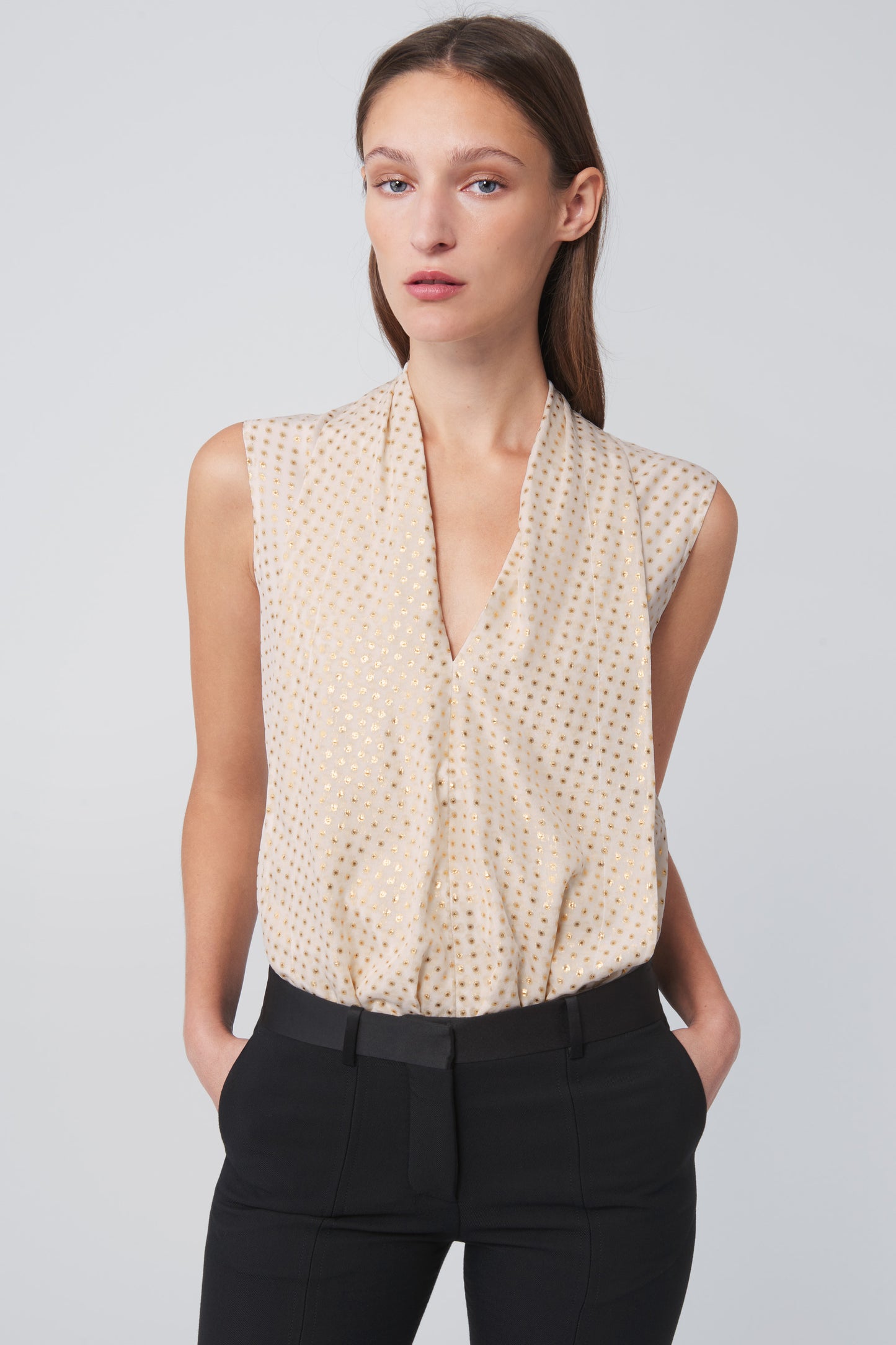 Sleeveless Flared Top In White Gold