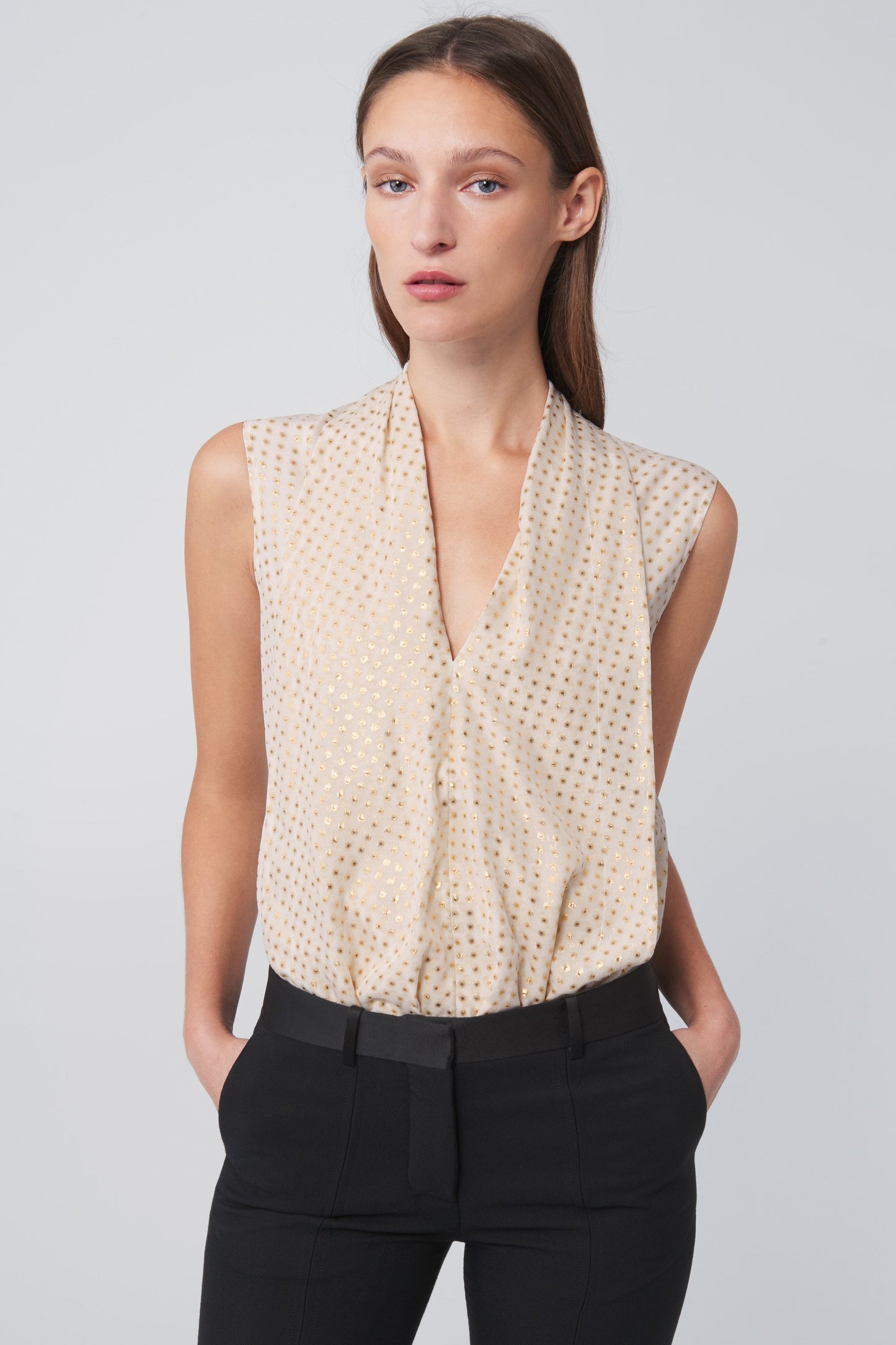 Sleeveless Flared Top In White Gold