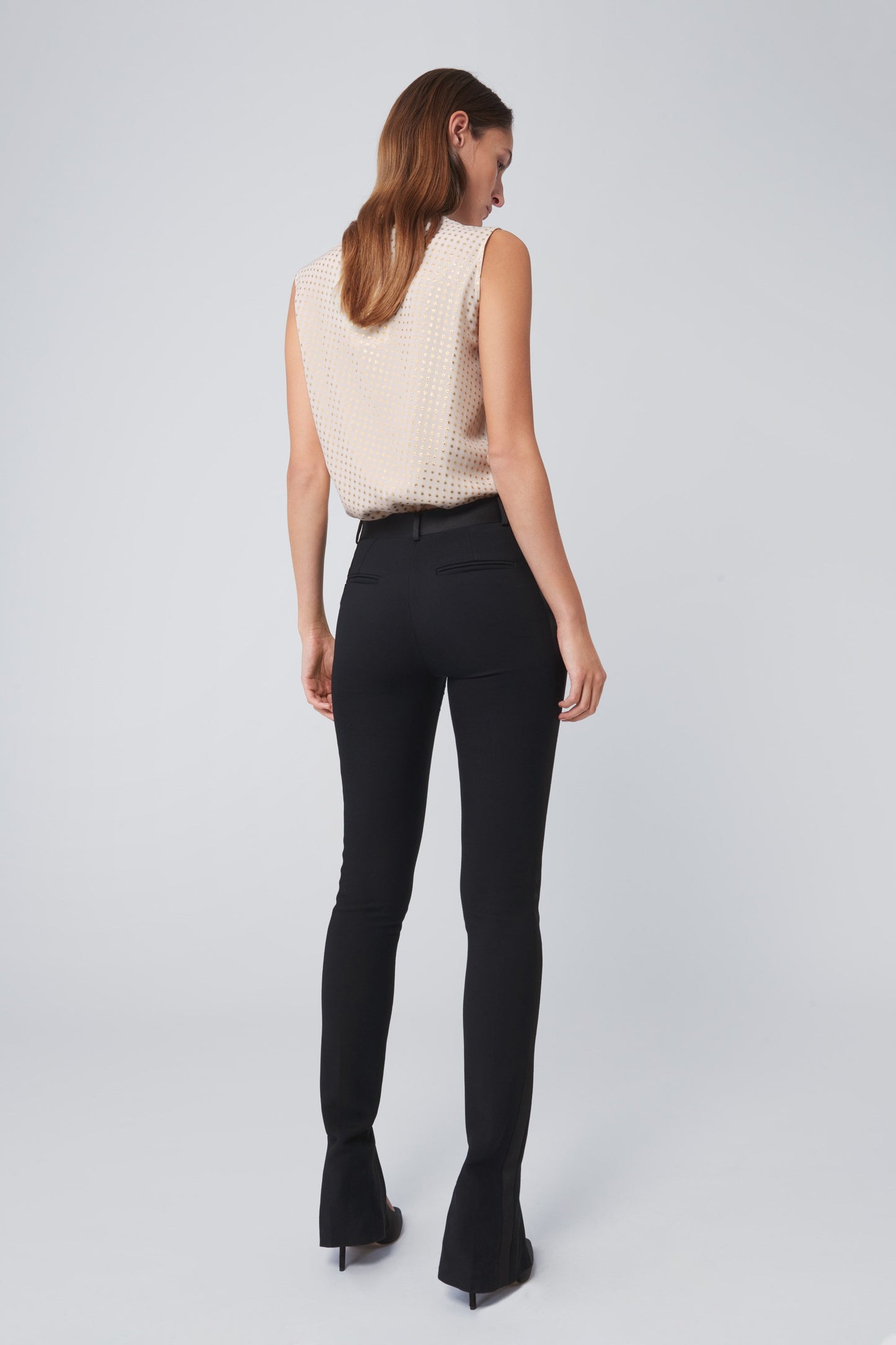 Sleeveless Flared Top In White Gold