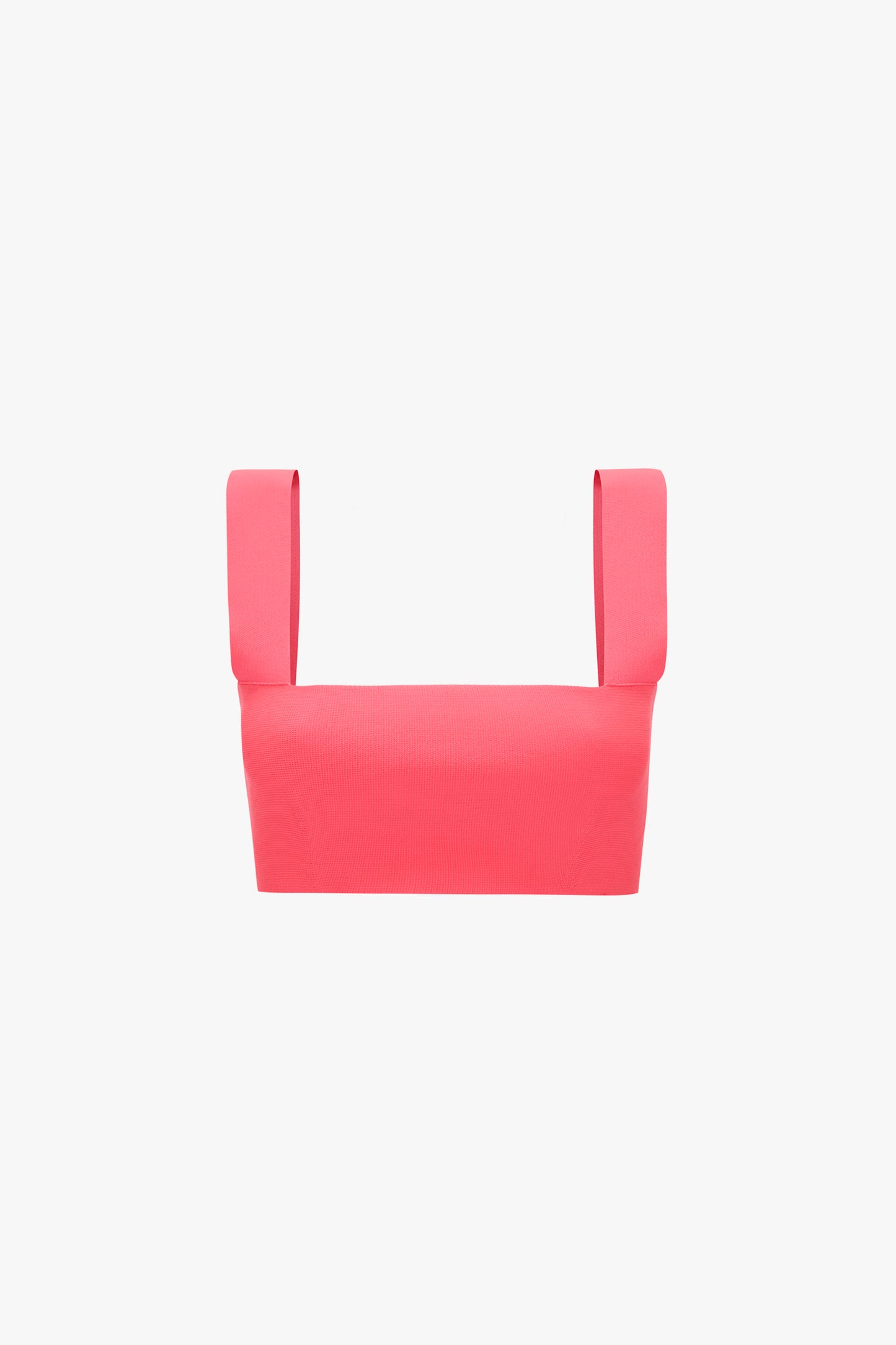 The Victoria Beckham VB Body Strap Bandeau Top in Pink is a bright pink sleeveless crop top with wide shoulder straps on a white background.