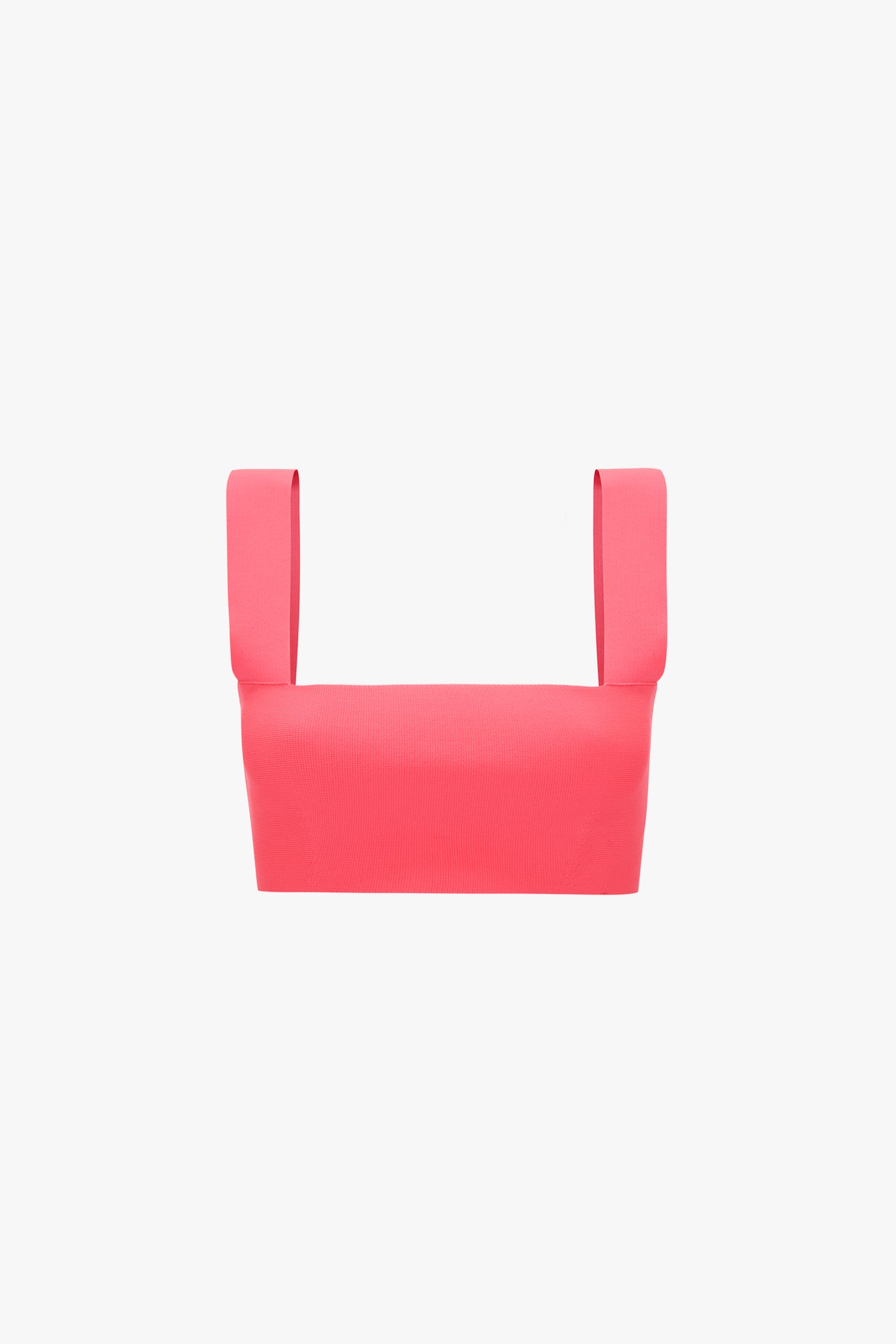 The Victoria Beckham VB Body Strap Bandeau Top in Pink is a bright pink sleeveless crop top with wide shoulder straps on a white background.