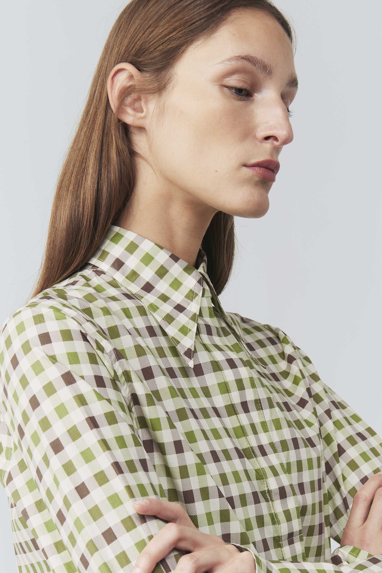 The model is wearing a Victoria Beckham 70's Collar Shirt.