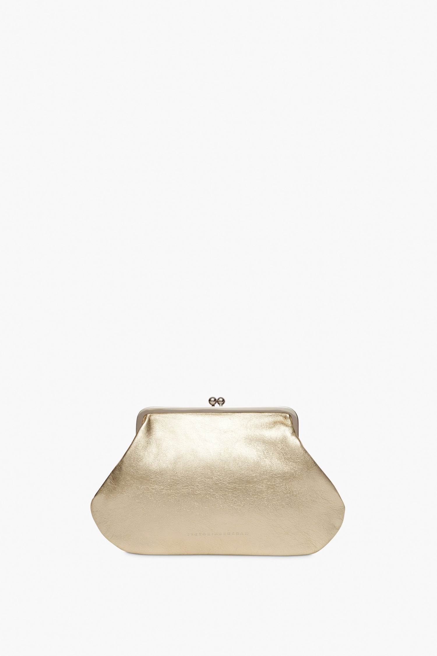 Victoria Beckham's Pocket Clutch in Gold features a kiss lock closure and a sleek silver frame, showcased against a plain white background.